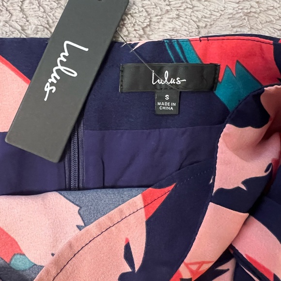 Lulu’s Navy Abstract Print wrap skirt with cropped halter top set. - Picture 3 of 9